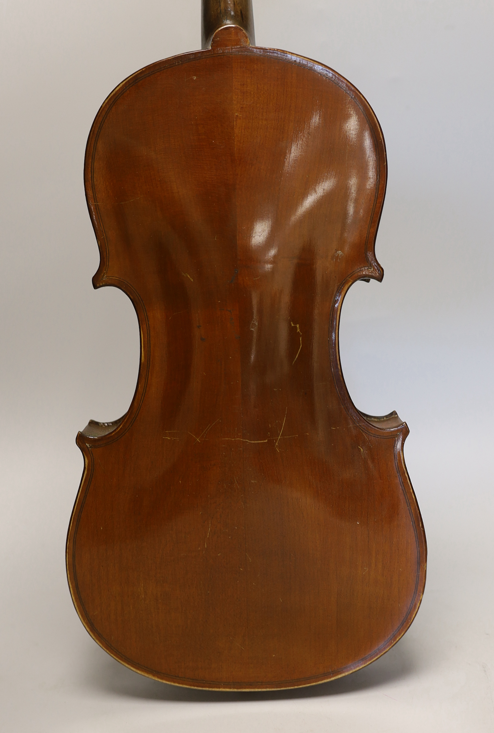 A three quarter size German violin, in case violin 56cm long